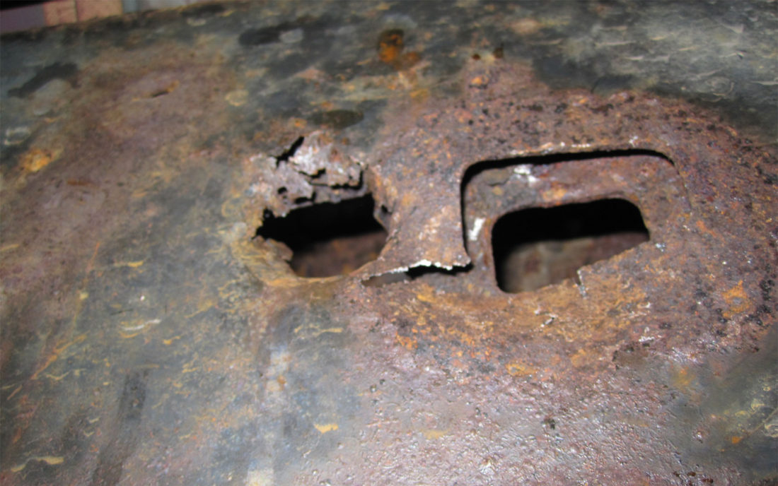 A hole in the frame of a Toyota Tacoma