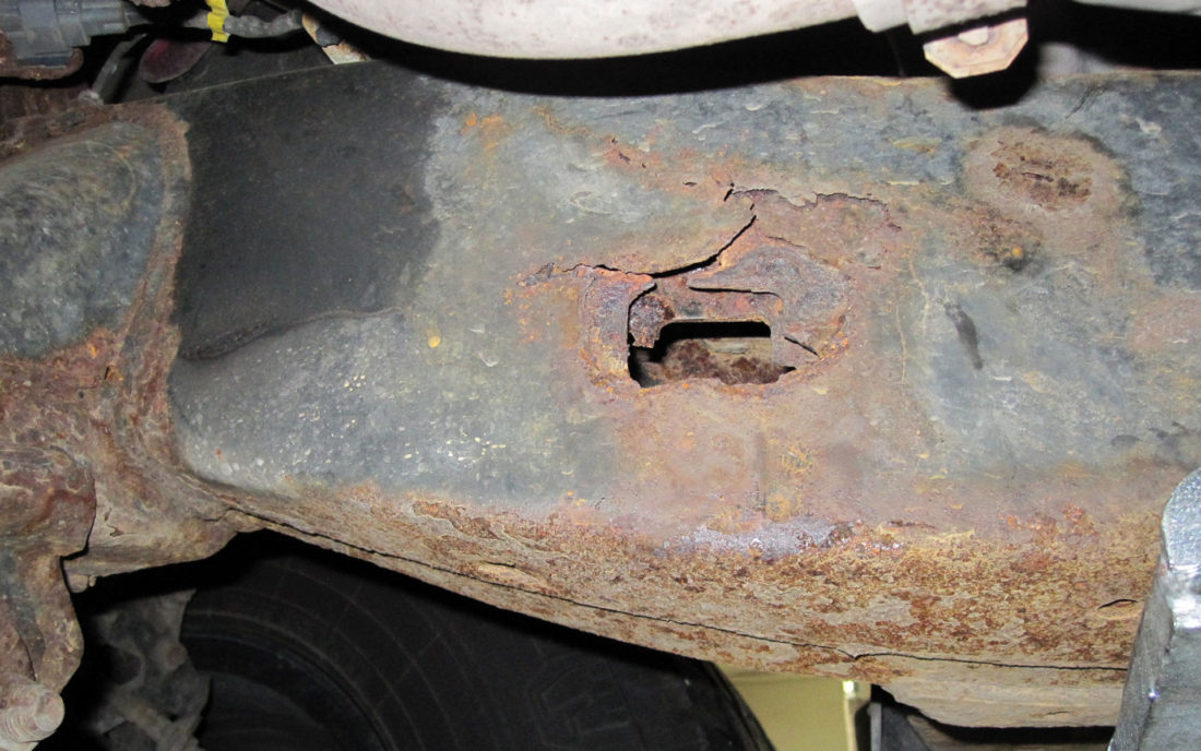 A hole in the frame of a recalled Toyota Tacoma